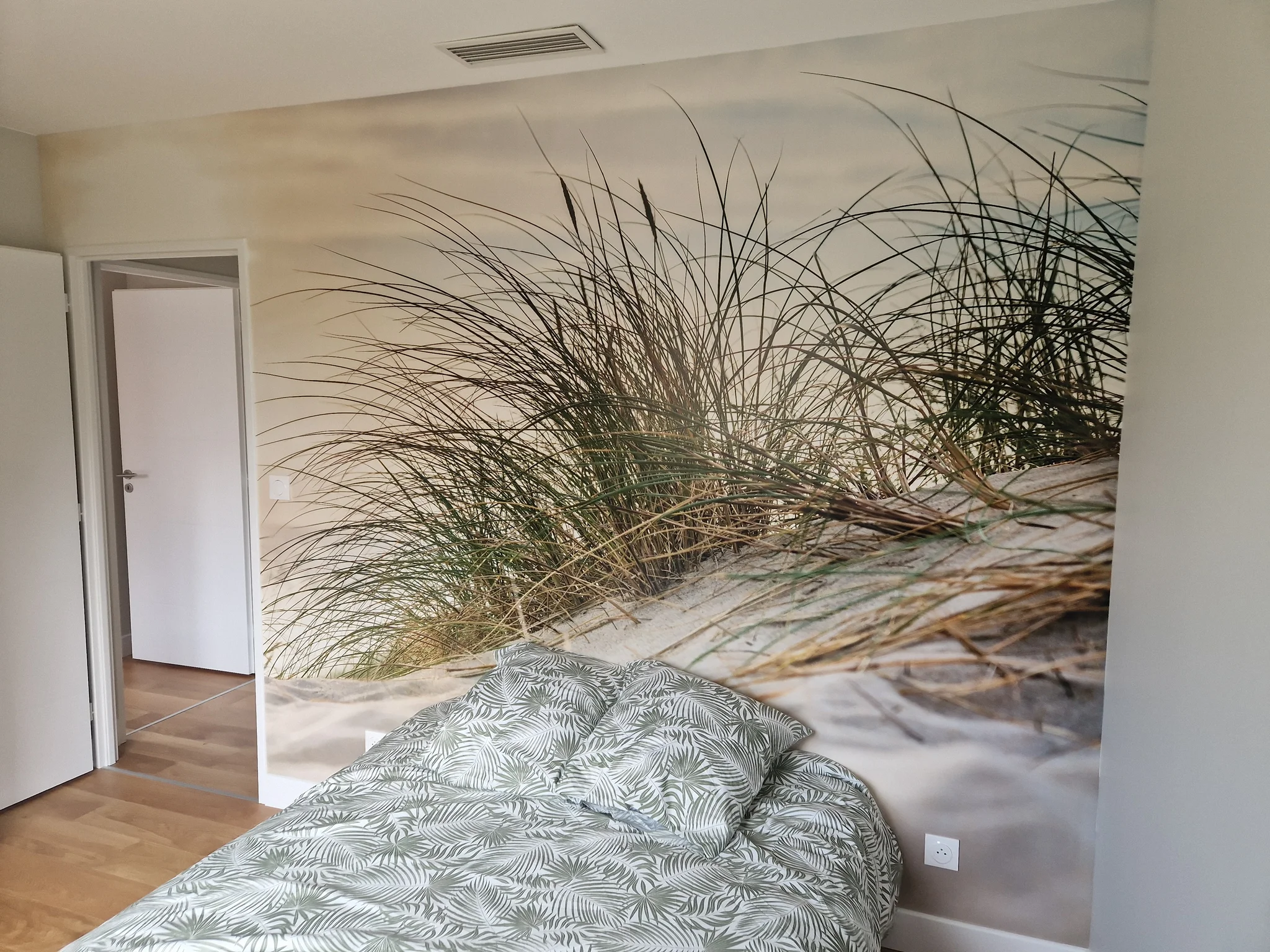 Papier peint panoramique dune et oyats dans une chambre